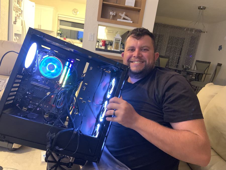 Mark Gabrielli with a computer he built